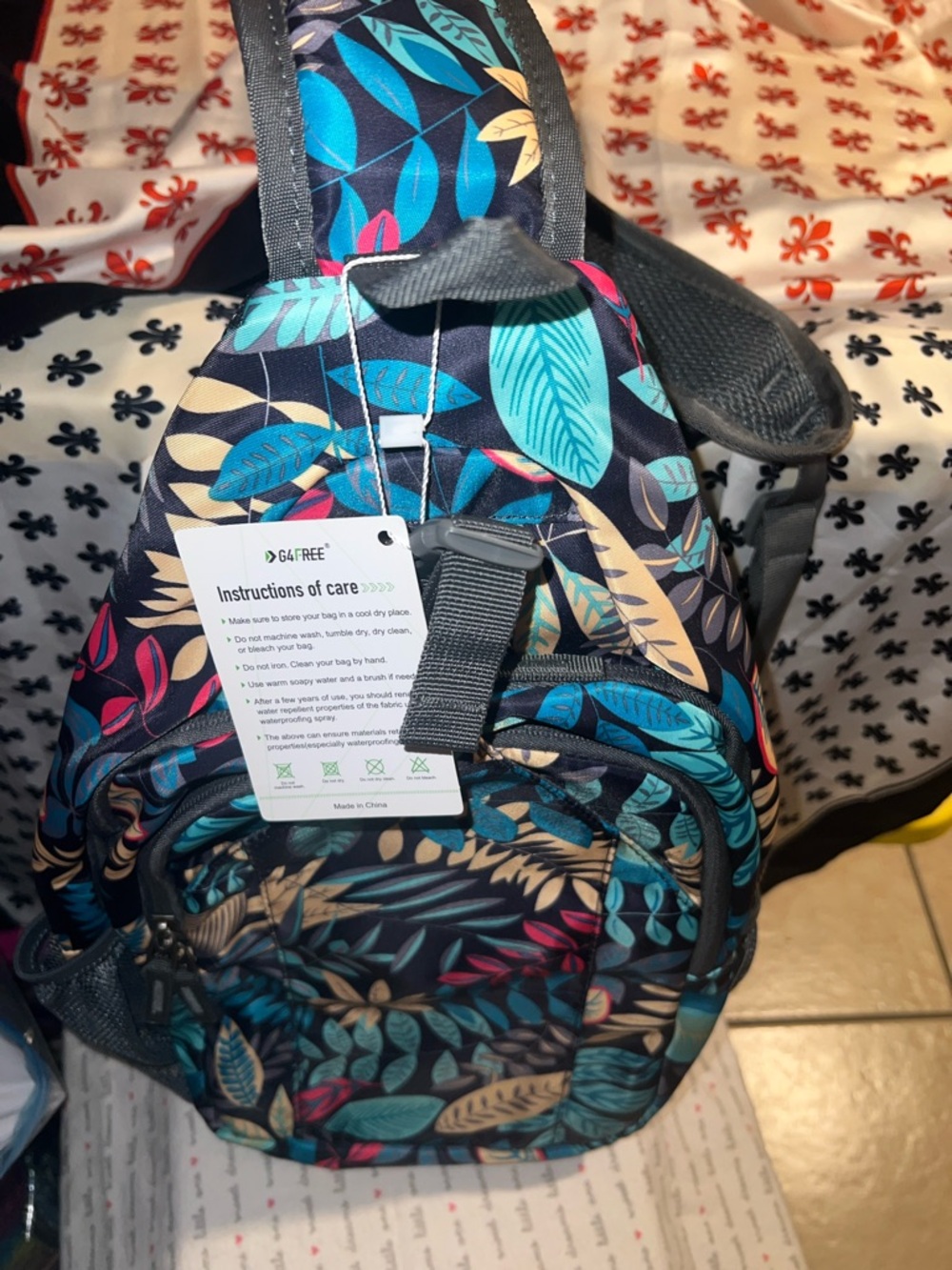 G 4 freeLeaf Print Sling Backpack - Teal, Navy & Beige